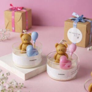 Adorable teddy bear candles with balloon decor in frangipani and gardenia scents from Windowsill.